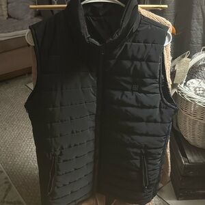 Black Quilted Stand-Up Collar Vest heated & water resistant.